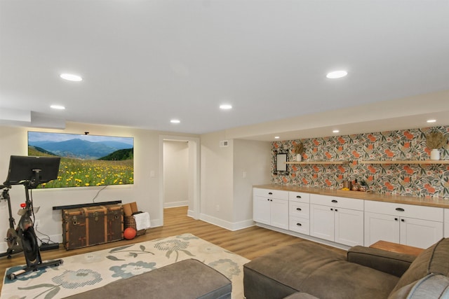 1103 W 20th Ave, Spokane, WA 99203 - living room featuring light wood-style floors, recessed lighting, and a dry bar