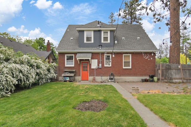 1103 W 20th Ave, Spokane, WA 99203 - rear view of house featuring brick siding and roof with shingles