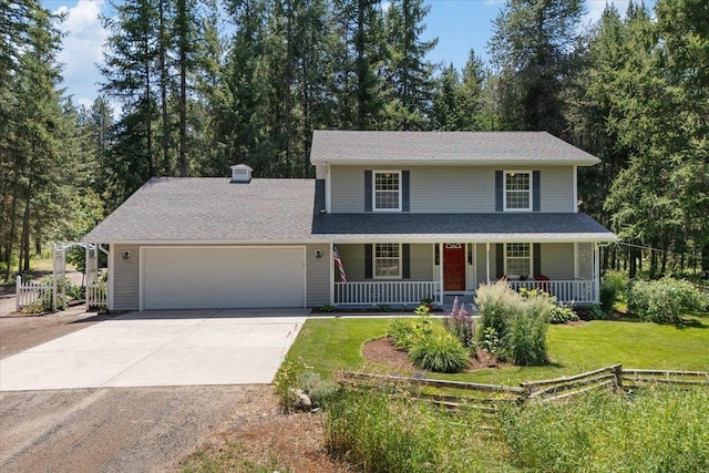 5245A W Prufer Crosscut Rd, Deer Park, WA 99006 - view of front of home featuring a porch, concrete driveway, and a garage