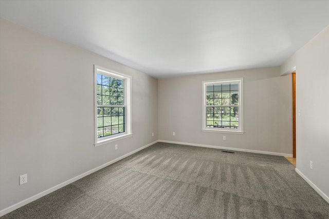 5245A W Prufer Crosscut Rd, Deer Park, WA 99006 - spare room featuring baseboards and carpet flooring