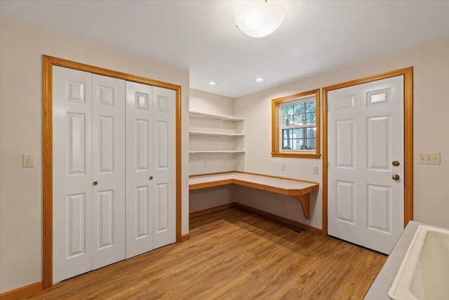 5245A W Prufer Crosscut Rd, Deer Park, WA 99006 - unfurnished office featuring built in desk, light wood finished floors, and recessed lighting