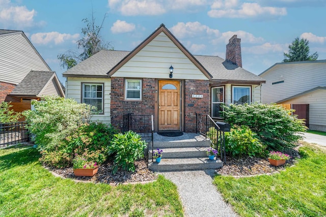 5224 N Post St, Spokane, WA 99204 - bungalow-style home with a chimney and roof with shingles