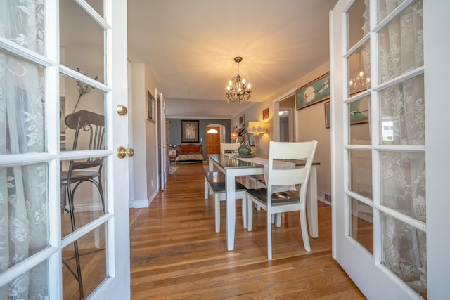 5224 N Post St, Spokane, WA 99204 - dining space featuring a chandelier and wood finished floors