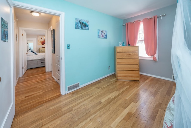 5224 N Post St, Spokane, WA 99204 - bedroom with light wood-type flooring and baseboards