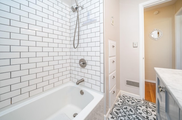 5224 N Post St, Spokane, WA 99204 - full bathroom with shower / bath combination, vanity, and wood finished floors