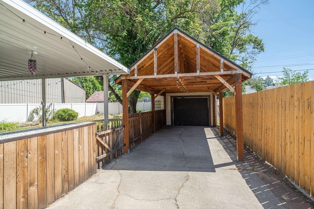 5224 N Post St, Spokane, WA 99204 - view of vehicle parking featuring a detached garage and concrete driveway