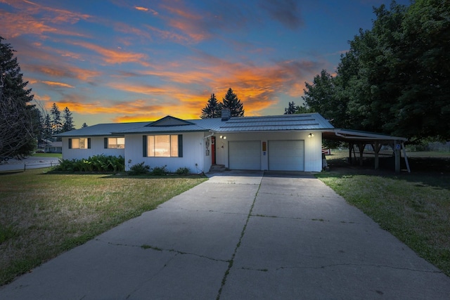 1401 W 1st St, Newport, WA 99156 - ranch-style home with an attached garage, a front yard, a metal roof, concrete driveway, and a chimney