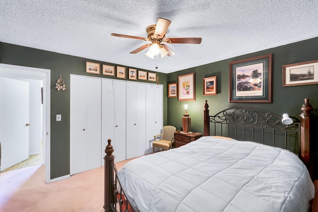 1401 W 1st St, Newport, WA 99156 - carpeted bedroom featuring a textured ceiling, a closet, and a ceiling fan