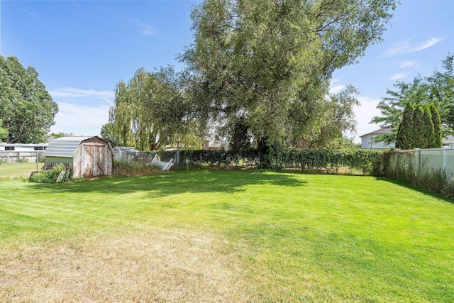 4110 E Ermina Ave, Spokane, WA 99217 - fenced backyard featuring a storage shed