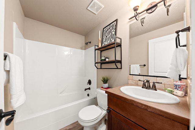 7014 E Columbia Dr, Spokane, WA 99217 - full bath featuring bathing tub / shower combination, vanity, and tasteful backsplash