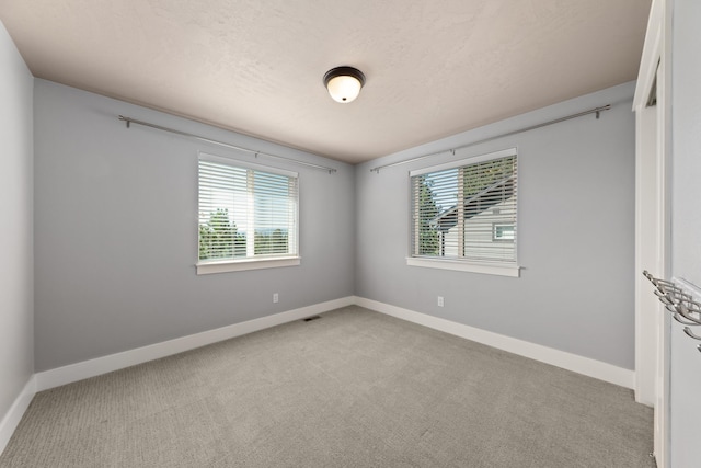 7014 E Columbia Dr, Spokane, WA 99217 - carpeted spare room with healthy amount of natural light