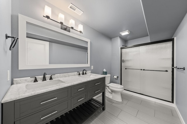 7014 E Columbia Dr, Spokane, WA 99217 - bathroom with double vanity and a shower stall