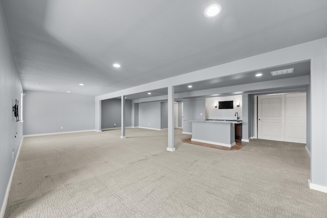 7014 E Columbia Dr, Spokane, WA 99217 - finished below grade area with light colored carpet and recessed lighting