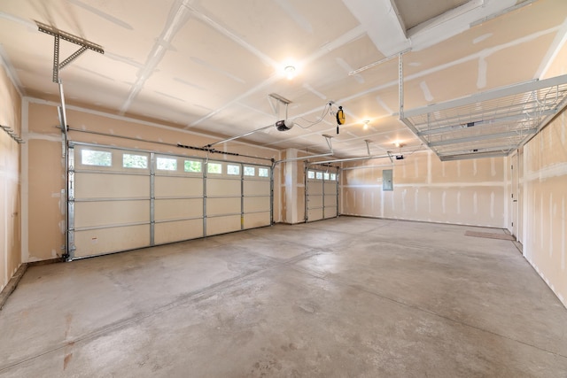 7014 E Columbia Dr, Spokane, WA 99217 - garage featuring a garage door opener and electric panel