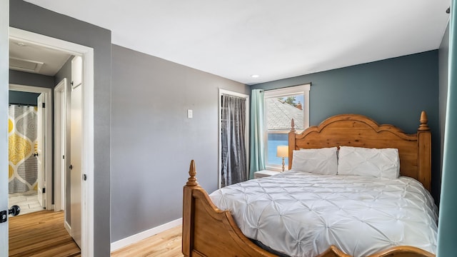 6121 N Belt St, Spokane, WA 99205 - bedroom with wood finished floors, attic access, and a closet