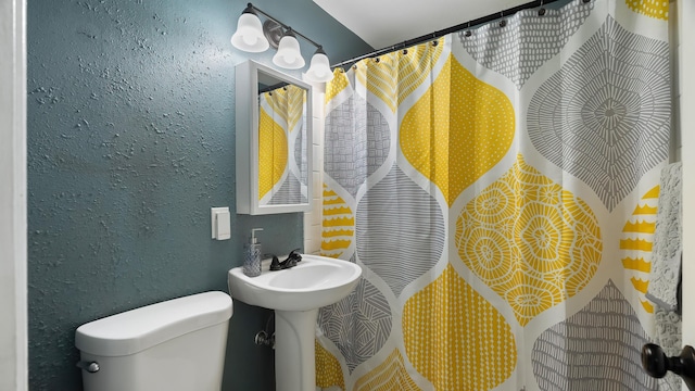 6121 N Belt St, Spokane, WA 99205 - bathroom with toilet and a textured wall