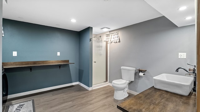 6121 N Belt St, Spokane, WA 99205 - full bath featuring wood finished floors, a stall shower, and recessed lighting