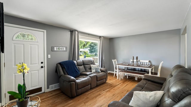 6121 N Belt St, Spokane, WA 99205 - living area featuring healthy amount of natural light and light wood-type flooring