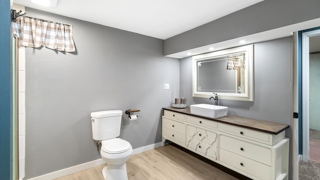 6121 N Belt St, Spokane, WA 99205 - bathroom featuring wood finished floors and vanity