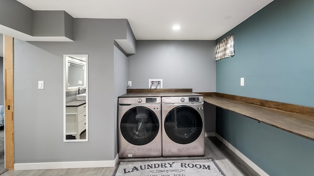 6121 N Belt St, Spokane, WA 99205 - laundry room featuring independent washer and dryer and wood finished floors
