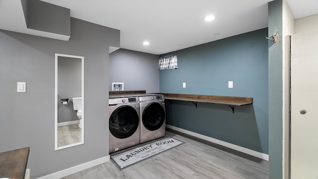 6121 N Belt St, Spokane, WA 99205 - washroom featuring washing machine and clothes dryer, wood finished floors, and recessed lighting