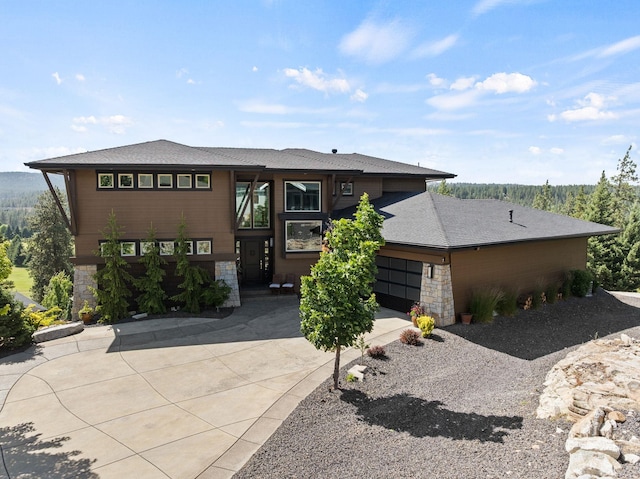 14210 N Wandermere Estates Ln, Spokane, WA 99208 - prairie-style home featuring driveway, stone siding, and a garage