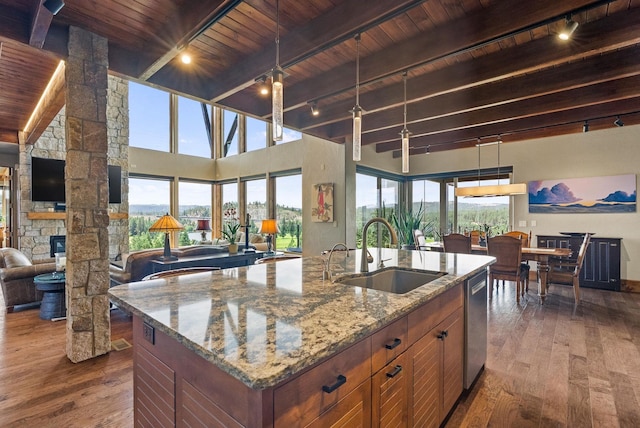 14210 N Wandermere Estates Ln, Spokane, WA 99208 - kitchen with a wood ceiling with exposed beams, track lighting, open floor plan, dark wood-style floors, and an island with sink