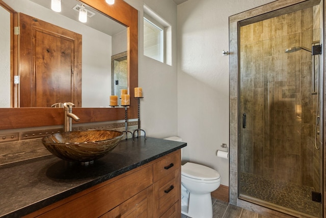 14210 N Wandermere Estates Ln, Spokane, WA 99208 - bathroom featuring a stall shower and vanity