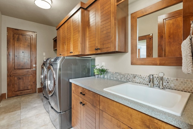 14210 N Wandermere Estates Ln, Spokane, WA 99208 - laundry room with cabinet space and washing machine and clothes dryer