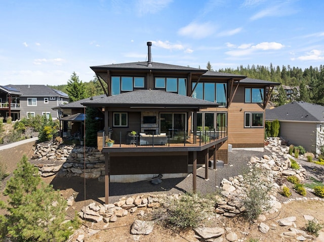 14210 N Wandermere Estates Ln, Spokane, WA 99208 - back of house featuring a wooden deck