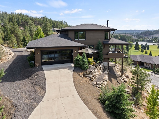 14210 N Wandermere Estates Ln, Spokane, WA 99208 - view of front of property with driveway, a garage, and roof with shingles