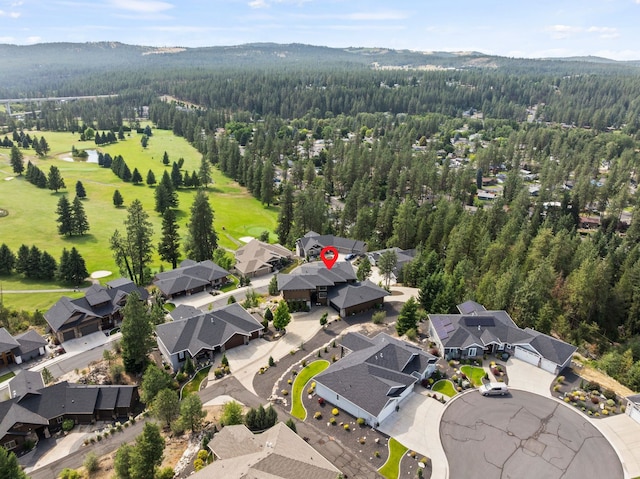 14210 N Wandermere Estates Ln, Spokane, WA 99208 - aerial overview of property's location with a forest and nearby suburban area