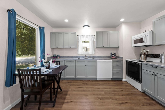 10124 N Wellen Ln, Spokane, WA 99218 - kitchen featuring white appliances, gray cabinetry, healthy amount of natural light, and recessed lighting