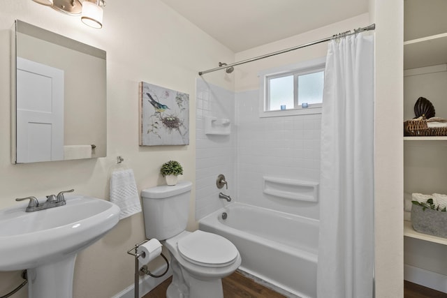 10124 N Wellen Ln, Spokane, WA 99218 - bathroom featuring shower / bath combo and wood finished floors