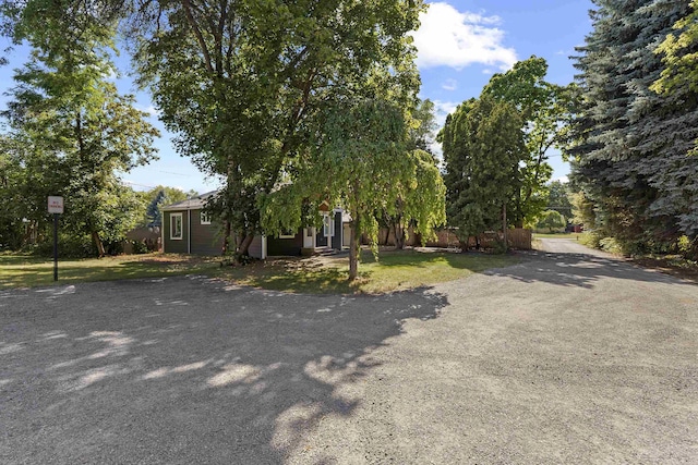 10124 N Wellen Ln, Spokane, WA 99218 - view of property hidden behind natural elements with driveway