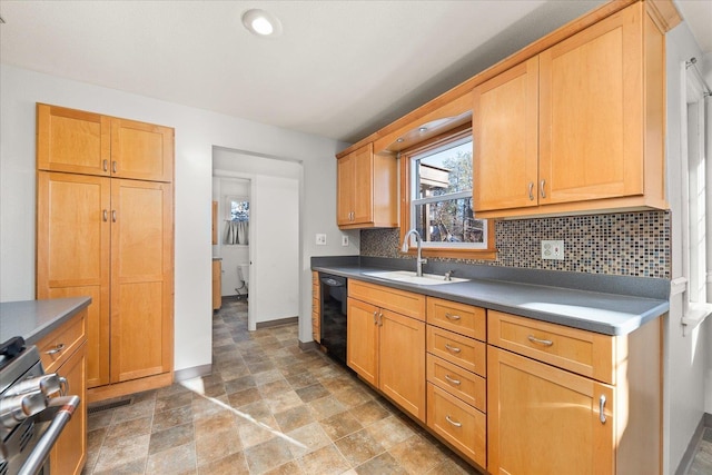 2828 S Arthur St, Spokane, WA 99203 - kitchen with range, dishwasher, decorative backsplash, stone finish flooring, and recessed lighting