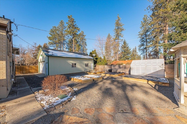 2828 S Arthur St, Spokane, WA 99203 - fenced backyard featuring an outbuilding