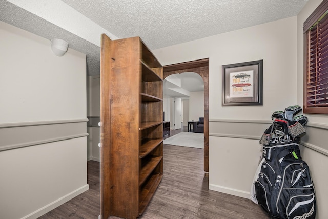 11912 N Atlantic St, Spokane, WA 99218 - spacious closet featuring arched walkways and wood finished floors