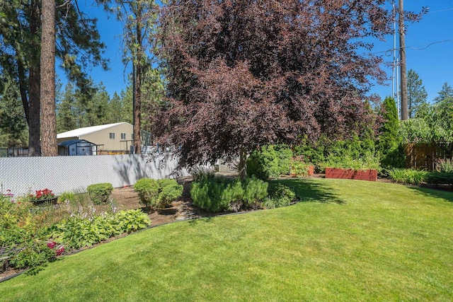 11912 N Atlantic St, Spokane, WA 99218 - view of yard featuring a carport