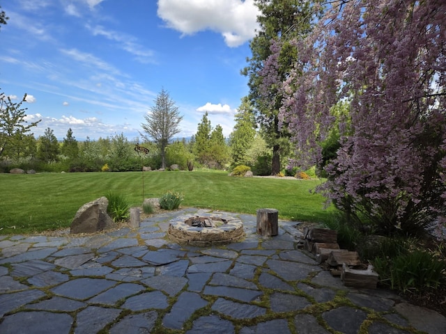 7116 S Linke Rd, Greenacres, WA 99016 - view of patio with an outdoor fire pit
