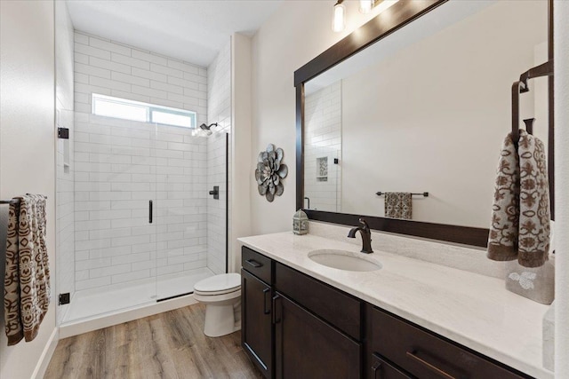 12918 E San Juan Ln, Spokane, WA 99206 - bathroom with vanity, a stall shower, and wood finished floors