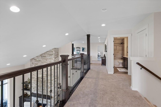 12918 E San Juan Ln, Spokane, WA 99206 - corridor with light colored carpet, an upstairs landing, and recessed lighting