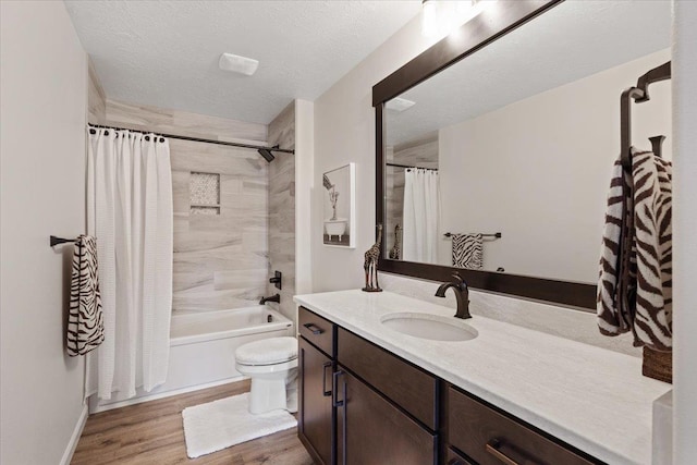 12918 E San Juan Ln, Spokane, WA 99206 - full bathroom with vanity, wood finished floors, shower / bathtub combination with curtain, and a textured ceiling