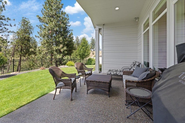 12918 E San Juan Ln, Spokane, WA 99206 - fenced backyard with outdoor lounge area and a patio