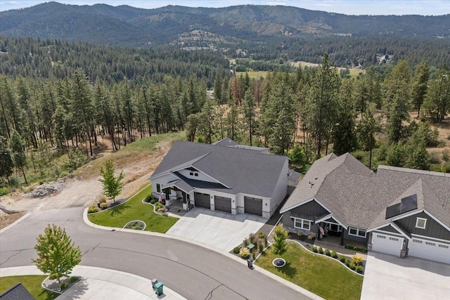 12918 E San Juan Ln, Spokane, WA 99206 - view of subject property featuring a mountainous background and a heavily wooded area