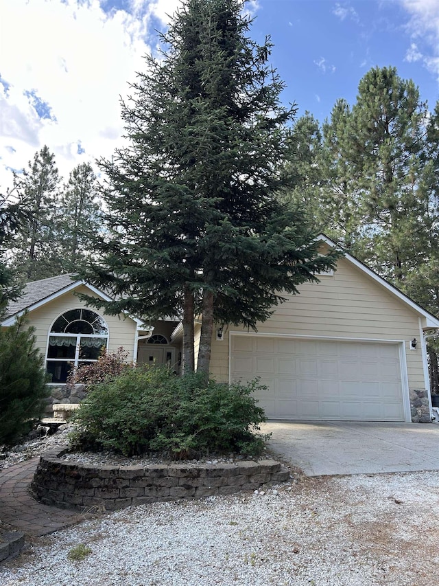 603 W Dennison-Chattaroy Rd, Deer Park, WA 99006 - view of front of property featuring concrete driveway and an attached garage