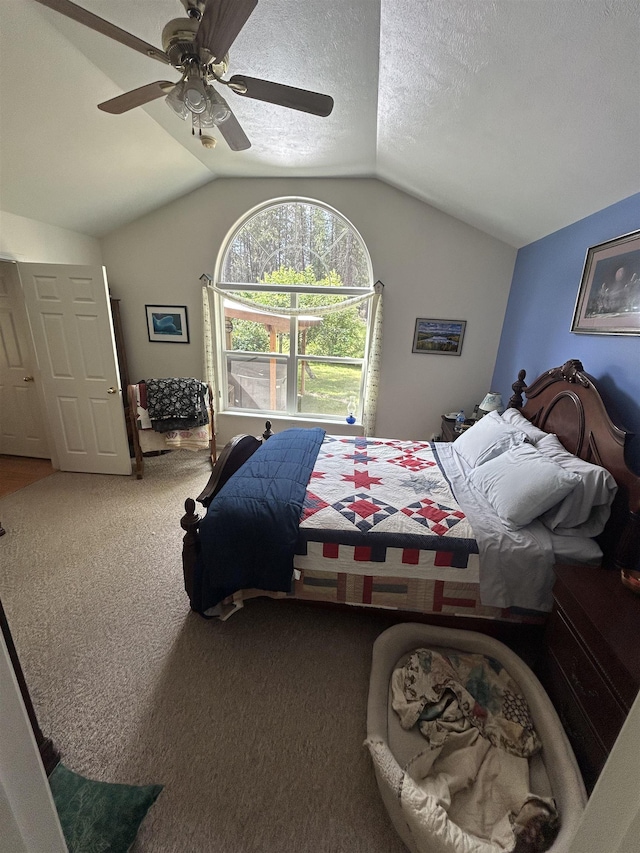 603 W Dennison-Chattaroy Rd, Deer Park, WA 99006 - bedroom with lofted ceiling, carpet floors, a ceiling fan, and a textured ceiling