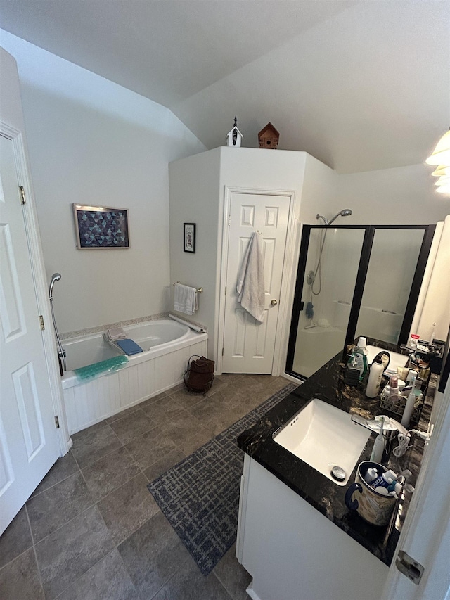 603 W Dennison-Chattaroy Rd, Deer Park, WA 99006 - bathroom with a bath, vanity, vaulted ceiling, and a stall shower