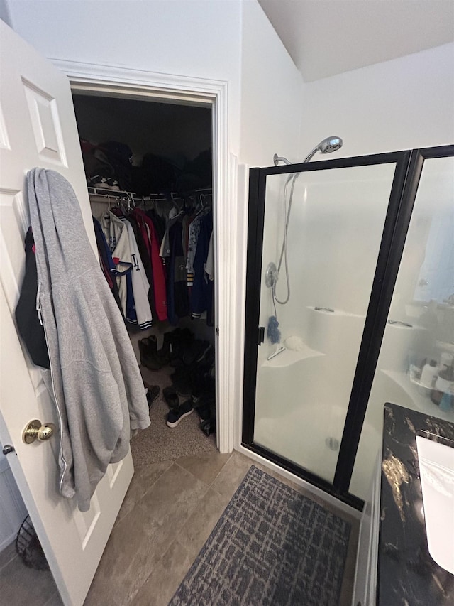 603 W Dennison-Chattaroy Rd, Deer Park, WA 99006 - bathroom with a shower stall and a walk in closet