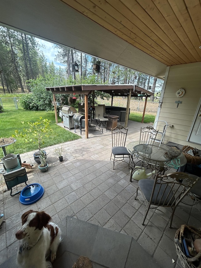 603 W Dennison-Chattaroy Rd, Deer Park, WA 99006 - view of patio with a hot tub and a grill